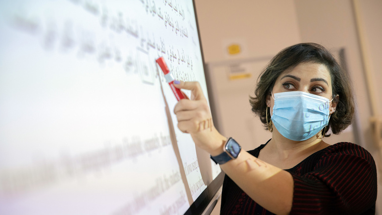 Instructor leads an Arabic course