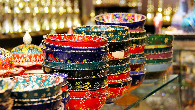 Bowls sitting on a glass shelf