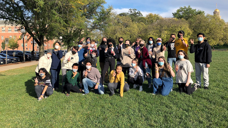 Students studying Japanese at the University of Iowa smile for a group photo