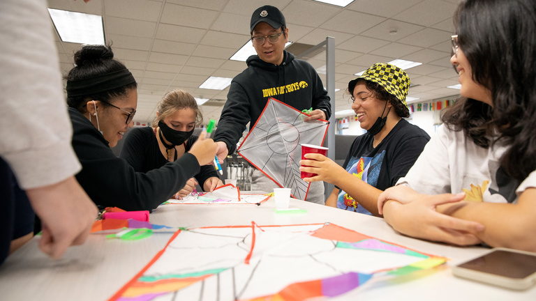 Students in the Korean Conversation Partners group making kites
