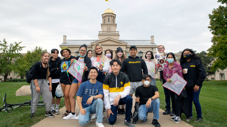 Conversation Partners group poses in front of the Old Capitol Building