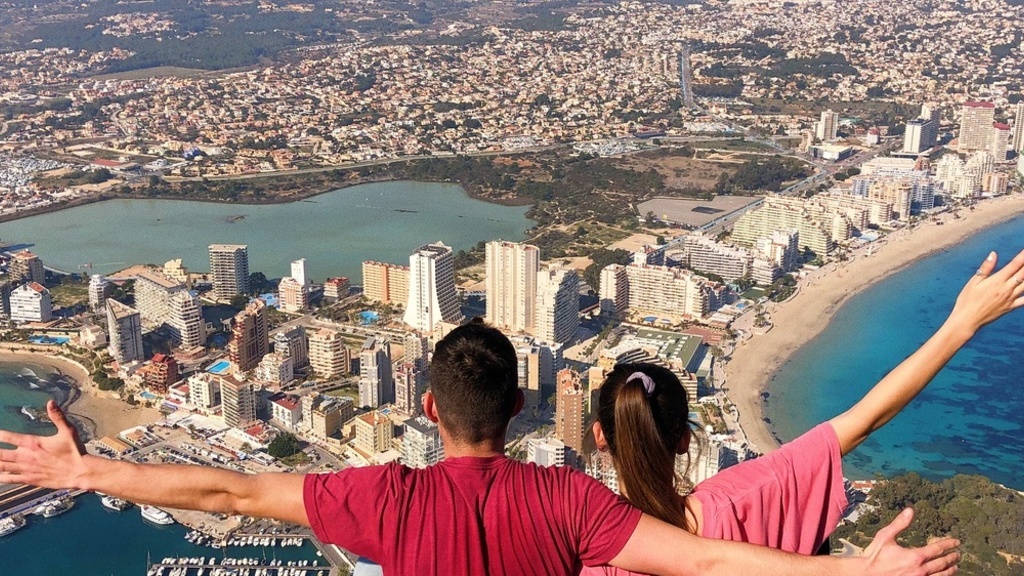 Picture of 2 people overlooking a city