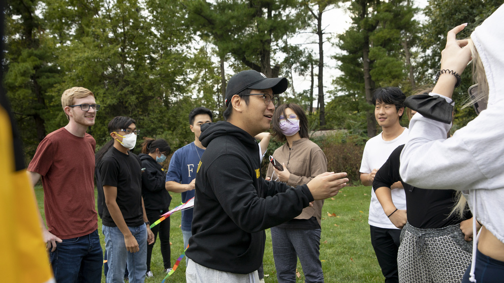 Students outside doing group work